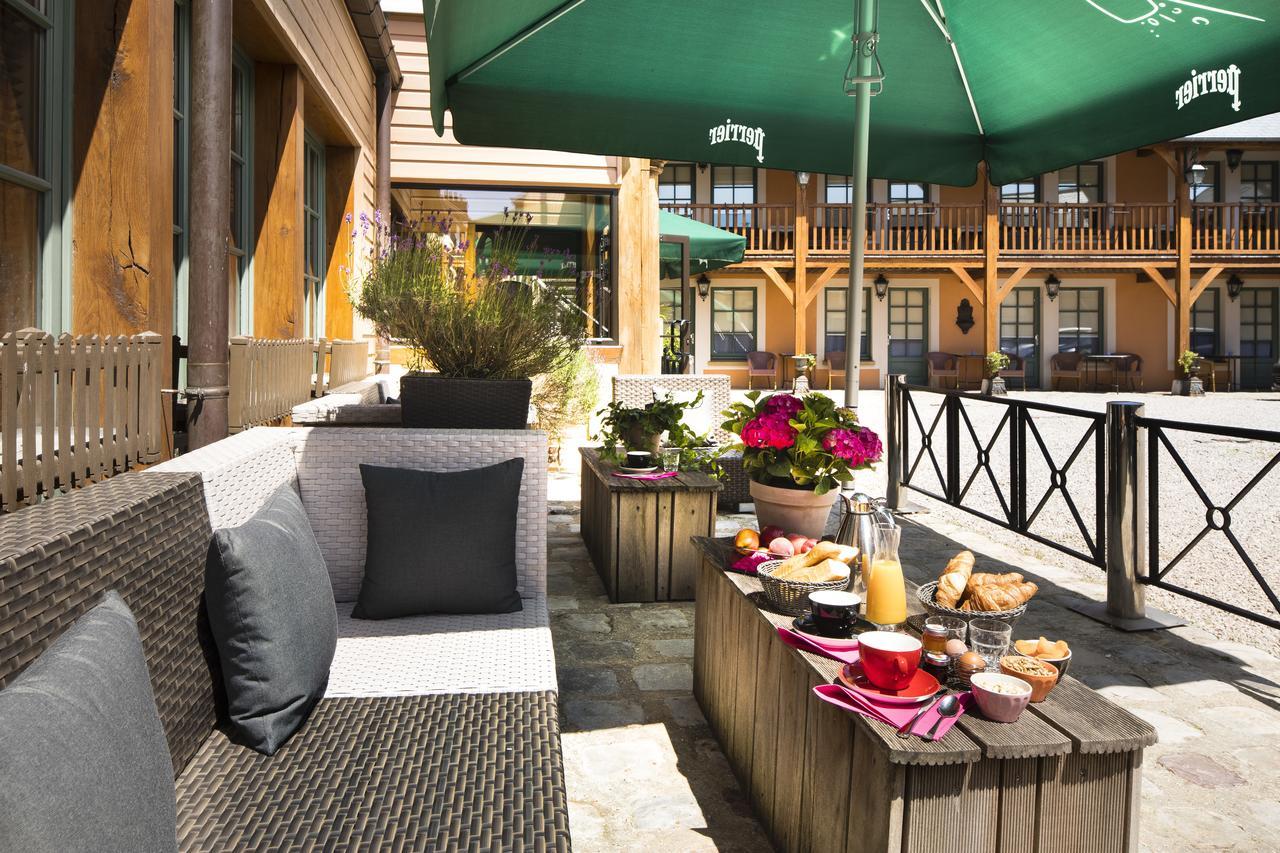 Hotel Et Spa Le Lion D'Or Pont-Évêque Esterno foto